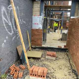 Brick masonry passage and structural steelwork preparation for a commercial site in Hull.