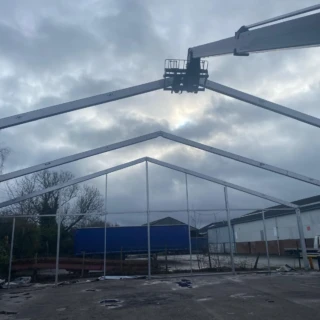 Wide view of a steel roof truss framework constructed for an industrial canopy in Hull.